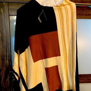 Ponchó never worn NWT